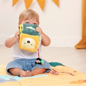 Child playing with Activity Cube - Jungle