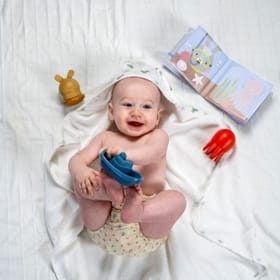 Child Enjoying the Bath-time Essentials Kit