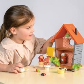 Child Playing with Robin's Nest Box