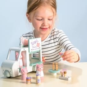 Child Playing with Kitty's Milkshake Van