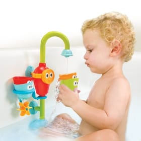 child enjoying Flow 'n' Fill Spout in the bath