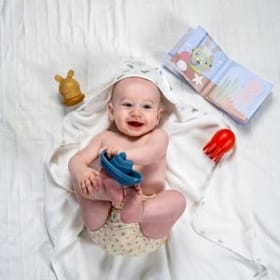 Child Enjoying the Bath-time Essentials Kit