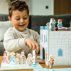 Child with Castle Play Set