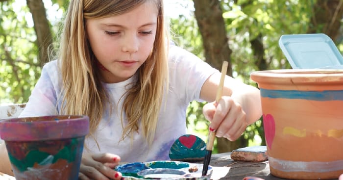 Girl Painting Plant Pots