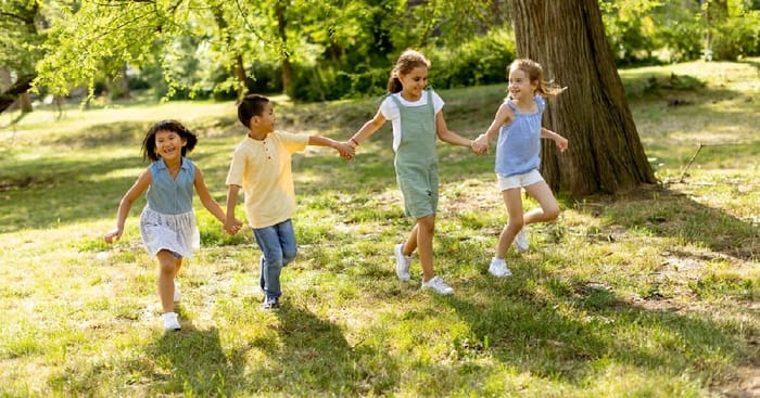 Children Holding Hands Outside