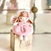 Fay Tooth Fairy sitting on a cube
