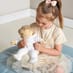 Child Playing with Baby Lilli Doll