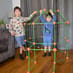 Children building a glow in the dark fort