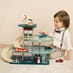 Child Playing with the Vintage Garage