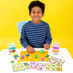 Child enjoying Clay & Play - Dino