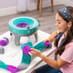 Girl using the Knitting Circle Studio making a scarf